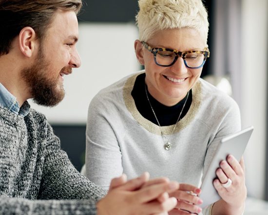Two people working together